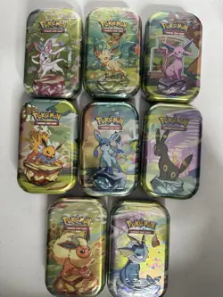 Pokemon Prismatic Evolutions Full Sealed set of 8 Mini Tins - Image 1