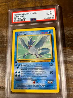 Pokemon 1999 Fossil ARTICUNO 1st Edition #17 PSA 8 RARE - Image 1