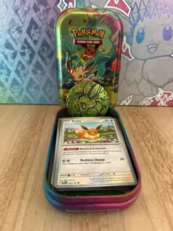 Leafeon Prismatic Evolutions Pokemon Mystery Mini Tin-Eevee Card + Cards + Coin - Image 1