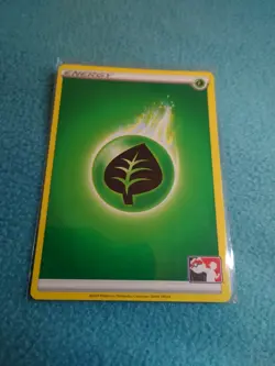 2020 POKEMON PRIZE PACK SERIES 1 GRASS ENERGY STAMPED LIGHTLY PLAYED. - Image 1