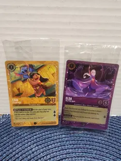 Disney Lorcana Elsa The Fifth Spirit & Lilo Escape Artist Foil Sealed Promo - Image 1