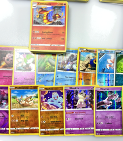 Pokemon TCG Trading Card Starter Mixed Lot 725 Modern Cards in Collectible Tin - Image 3