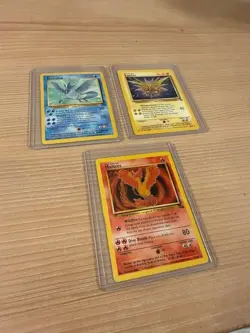 Pokemon TCG Moltres, Zapdos, Articuno 1999 Fossil Set Rare Cards in Sleeves - Image 1
