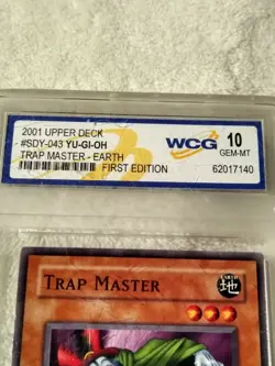 Yu-Gi-oh! 1st EDITION Trap Master 1996 graded by WCG at 10 GEM MT - Image 5