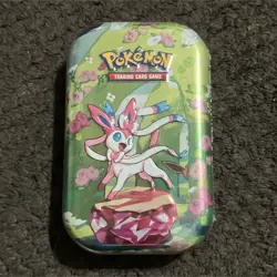 Pokemon Sylveon Tin Prismatic Evolutions Pokemon TCG 2025 Multicolor - Image 1