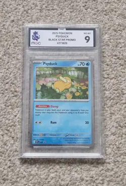 MGC 9 - Psyduck MEP 007 Cosmo Holo Pokemon Card - Black Star Promo - Image 1