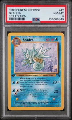 1999 POKEMON FOSSIL 1ST ED #42 SEADRA PSA 8 - Image 1