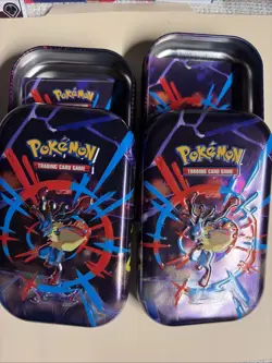 2025 Pokemon Empty Tins (2) With Card And Stickers . No Packs - Image 1