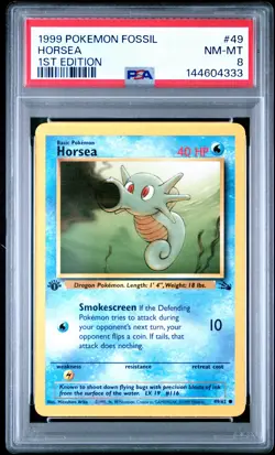 1999 POKEMON FOSSIL 1ST EDITION #49 HORSEA PSA 8 - Image 1