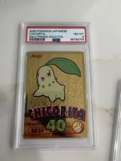 Meiji 2000 Pokemon Chikorita Promo Gold Foil Japanese PSA 8 Vintage Card - Image 1