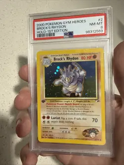 2000 POKEMON GYM HEROES HOLO-1ST ED #2 BROCK'S RHYDON PSA 8 - Image 1