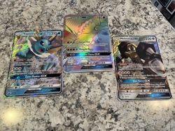 POKEMON Lot Of 3 Ho-Oh GX Vaporeon GX Melmetal GX - Image 1