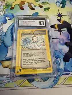 Pokemon TCG Professor Elm's Training Method Trainer Expedition 148/165 CGC 8.5 - Image 1