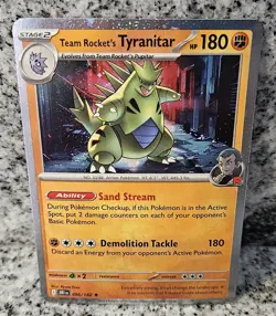Team Rocket's Tyranitar Cosmos Holo Promo Cards & Products 096/182 - Image 1