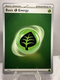 Pokemon TCG Leaf Energy Cosmic Holo Card Basic SVE 001 Swirl - Image 1
