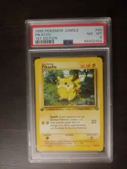 Pokemon 1999 Pikachu #60 1st Edition Jungle PSA 8 - Image 1