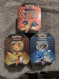 Pokemon Hidden Fates Tins (Set of 3 Tins) - Charizard, Raichu, Gyarados Art Set - Image 1