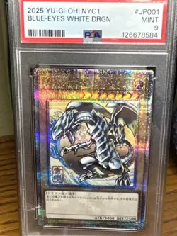 Konami Blue-Eyes White Dragon 2025 NYC1 JP001 Stamped Holo PSA 9 Monster - Image 1