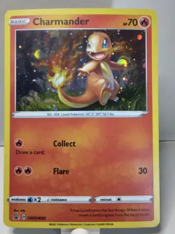 Pokemon TCG Charmander SWSH092 Black Star Promo Cosmos Holo NM Holding Cosmos - Image 1