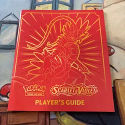 Pokemon Scarlet & Violet ETB Base Koraidon Red Player’s Guide Book - Image 1