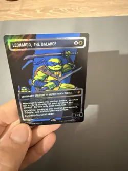 MTG Leonardo, the Balance 0083 Borderless Surge Foil Pixel Art TMNT in Hand - Image 1