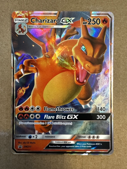 2016-19 Pokemon SM Black Star Promos Charizard #SM211 Ultra Rare NM or better - Image 1
