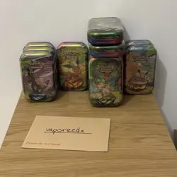 Pokemon TCG Scarlet & Violet Prismatic Evolutions Mini Tin x12 Bundle - SEALED - Image 1