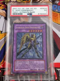 PSA 7 - Elemental Hero Darkbright TAEV-EN042 1st Edition Ultimate Rare YuGiOh - Image 1
