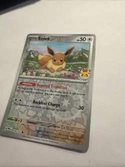 Pokemon TCG Prismatic Evolutions Eevee 074/131 - Stamped Reverse Holofoil Card - Image 2
