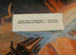 Secret Lair Drop: Transformers: Optimus Prime vs. Megatron - *Traditional Foil* - Image 1