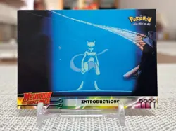 1999 Topps Pokemon the First Movie #21 (Introductions) Blue Logo NM - Image 1