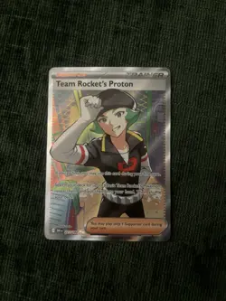 Pokemon TCG Team Rocket’s Proton 227/182 Full Art Trainer Destined Rivals - Image 1