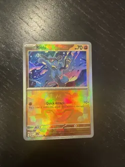 Pokemon TCG Riolu Master Ball Pattern Holo Card 050/131 Prismatic Evolutions - Image 1