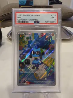 Pokemon TCG Riolu Illustration Rare Card #215/198 Scarlet & Violet PSA 9 - Image 1