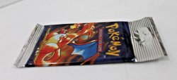 1999 Pokemon Base Set Unlimited Long Crimp Charizard Booster Pack LIGHT, SEALED - Image 4
