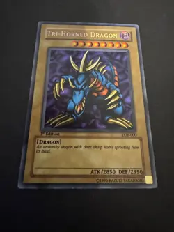 YUGIOH! Tri-Horned Dragon LOB-000 Secret Rare 1st Edition MP - Image 1