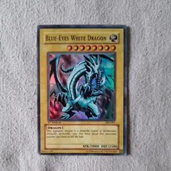 SKE-001 Yu Gi Oh Blue Eyes White Dragon 1st Edition Super Rare damaged - Image 1