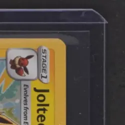 2020 POKEMON SWSH VIVID VOLTAGE COLLEC. CHEST PROMO #047/185 JOLTEON COSMOS HOLO - Image 5