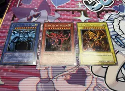 Yugioh GBI Secret Rare Promo Egyptian God Set Obelisk Slifer Ra LP - Image 1