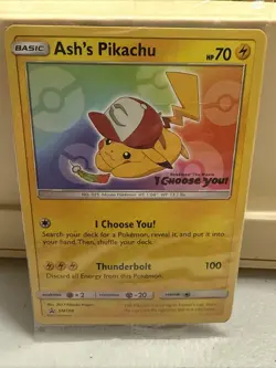 Ash’s Pikachu SM108 Ultra Rare Non Holo Movie Promo Pokemon Card * Sealed * - Image 1