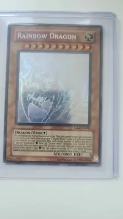 Misprint of the yugioh card Ghost Rare Rainbow Dragon from Tactical Evolution - Image 2