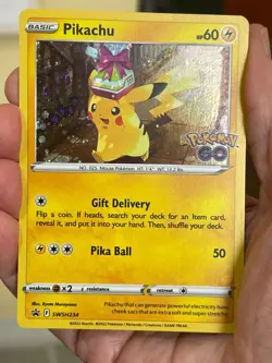 POKEMON PIKACHU SWSH234 POKEMON GO PROMO BLACK STAR COSMOS HOLO SWIRL NM CARD - Image 1