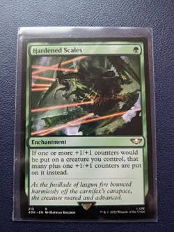 Hardened Scales / Universes Beyond: Warhammer 40,000 / Regular Magic MTG - Image 1