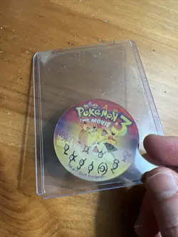 Unown 3D Lenticular Promo Coin - Pokemon The Movie 3 - Nintendo/WB Kids - Image 1