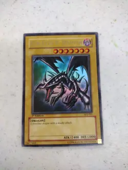 Yugioh Red-Eyes Black B Dragon SDJ-001 Ultra Rare 1st Edition LP 1996 - Image 1