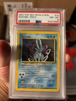 2001 P.M. Neo Revelation Suicune Holo Card PSA Grade 8 - Image 1