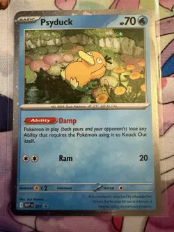 Psyduck (007) Pokemon ME01: Mega Evolution Promo Card Cosmos Holo - Image 1