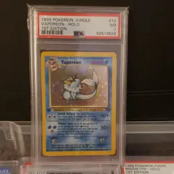 Pokemon Vaporeon Jungle 1st Edition 12/64 Holo Rare 1999 PSA 7 - Image 1