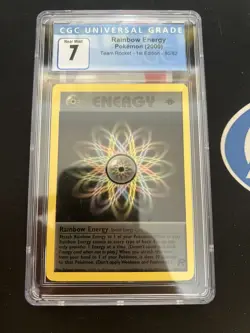 2000 POKEMON TEAM ROCKET 1ST EDITION RAINBOW ENERGY 80/82 CGC 7 NM - Image 1