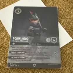 Disney Lorcana Robin Hood Champion of Sherwood (Enchanted) 221/204 - Image 1